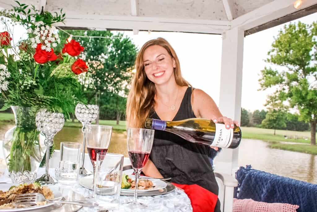 pouring wine during dinner date